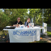 Happy organisers welcoming people at the entrance to BornHack 2016